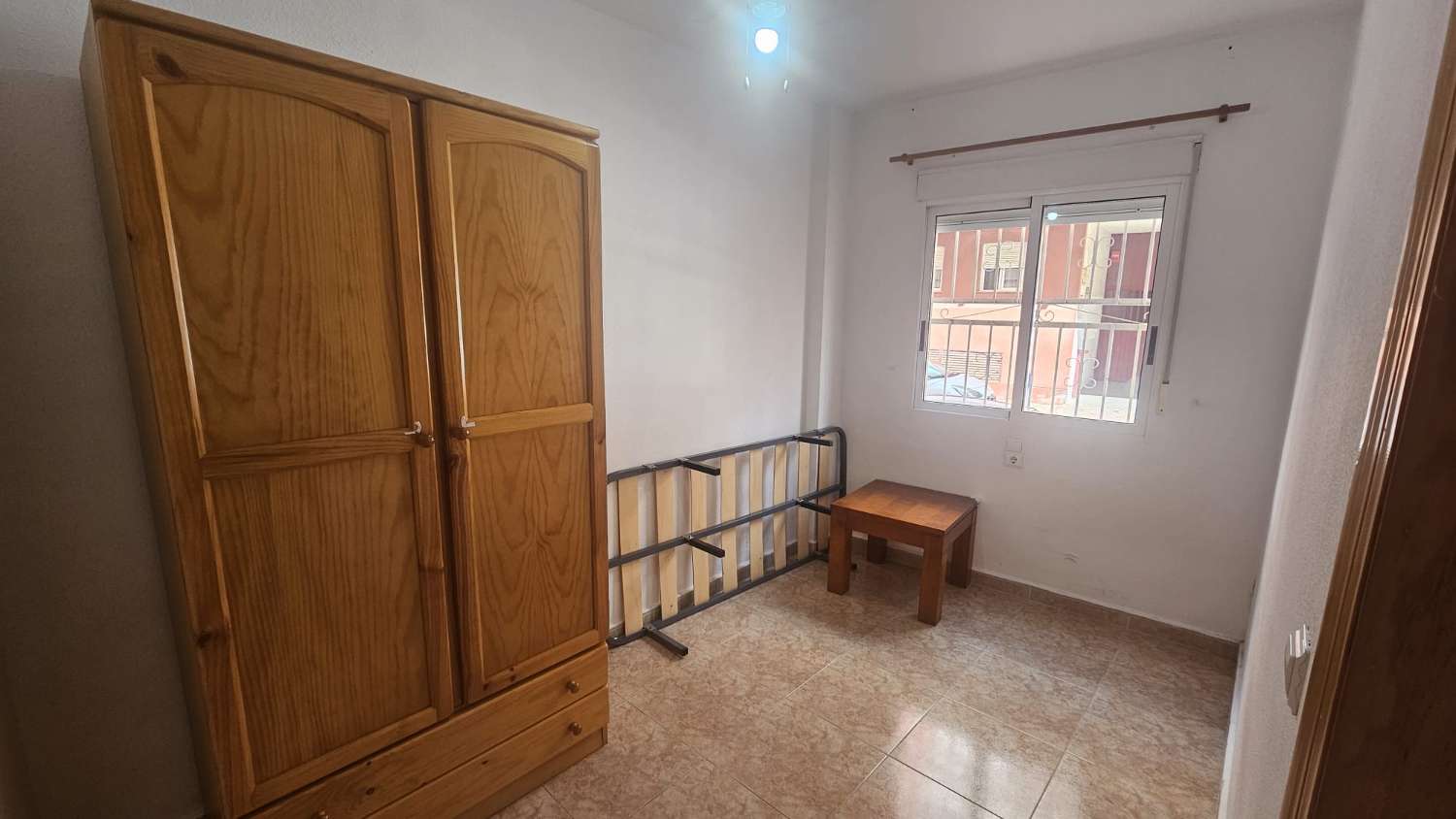 aPARTAMENTO CON GARAJE Y PISCINA COMUNITARIA